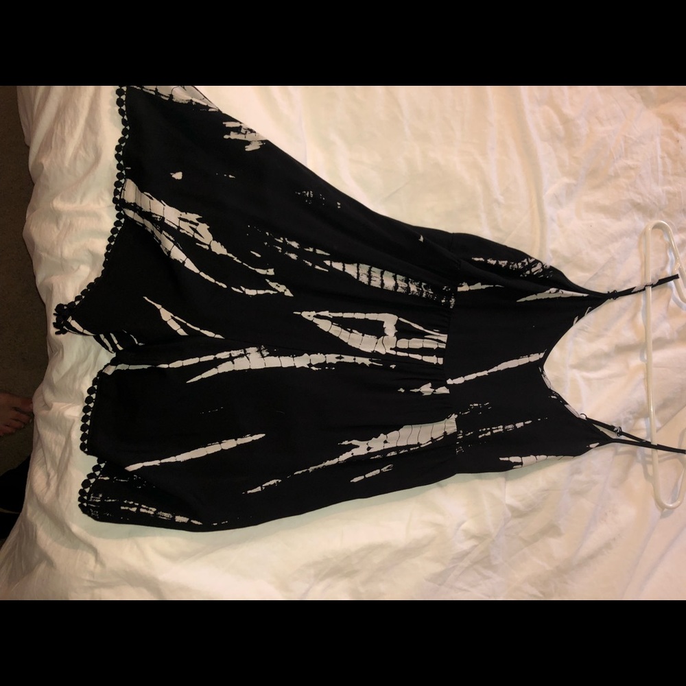 Black womens romper loose size small but can fit M
